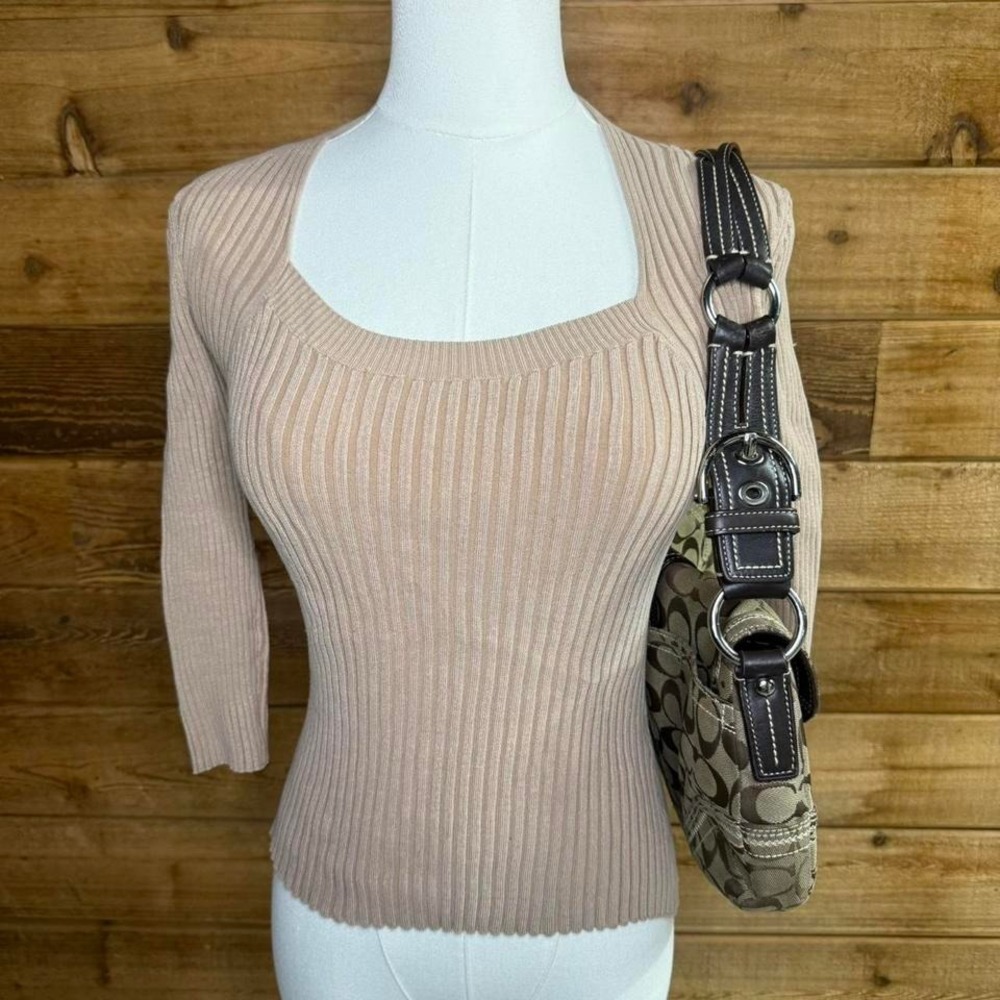 Tan ribbed knit top with a square necklines
